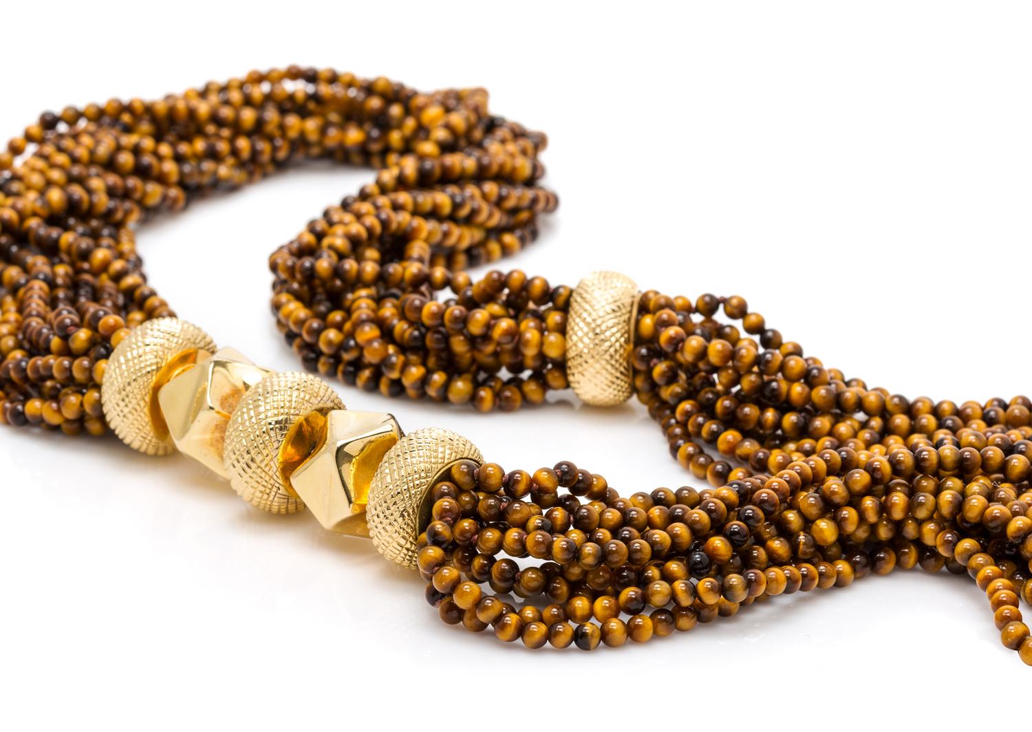 An 18 Karat Yellow Gold and Tiger's Eye Quartz Multi Strand Longchain Necklace, Van Cleef and Arpels,