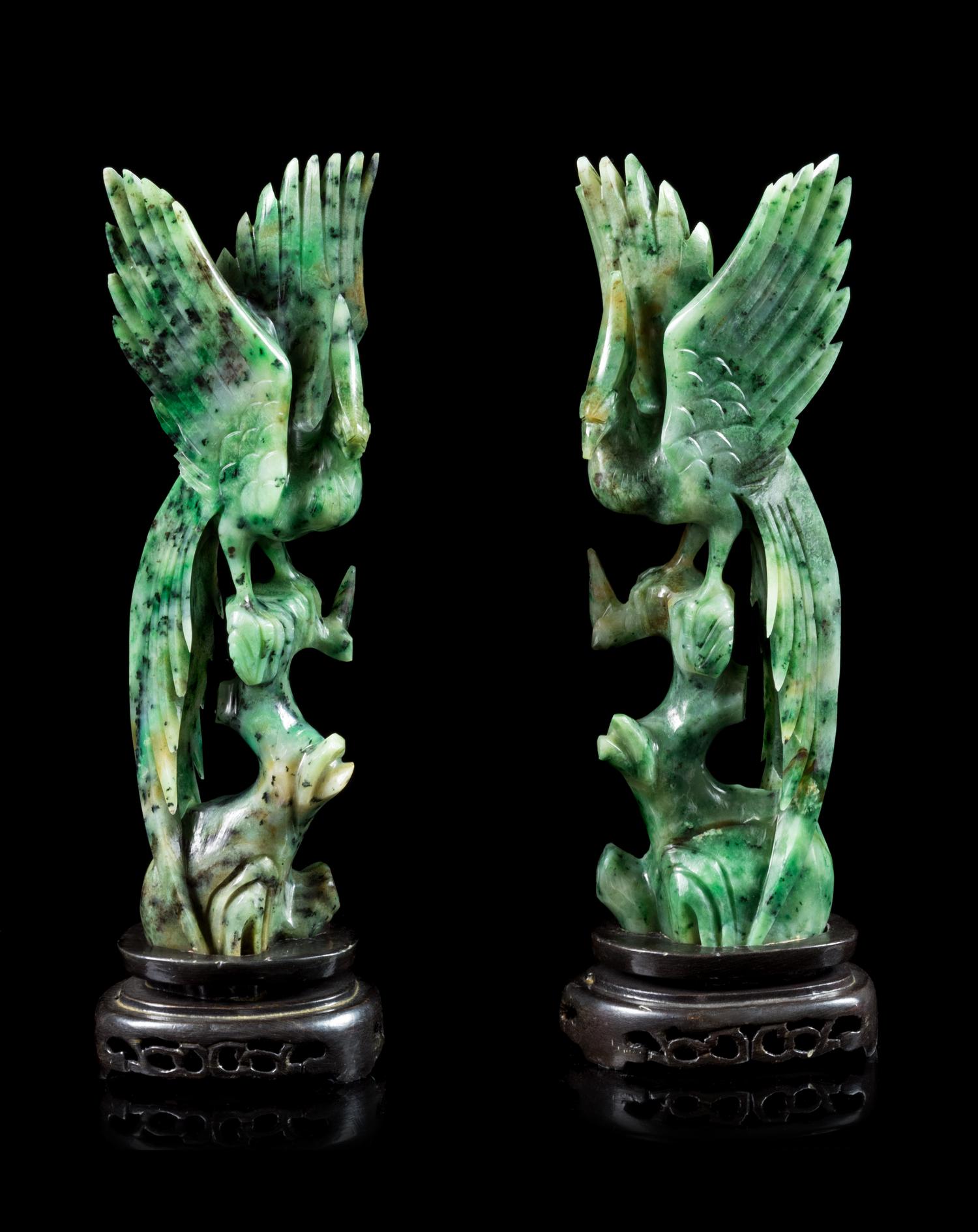 A Pair of Spinach Jade Figures of Birds Height of each 7 3/4 inches. — 20TH CENTURY