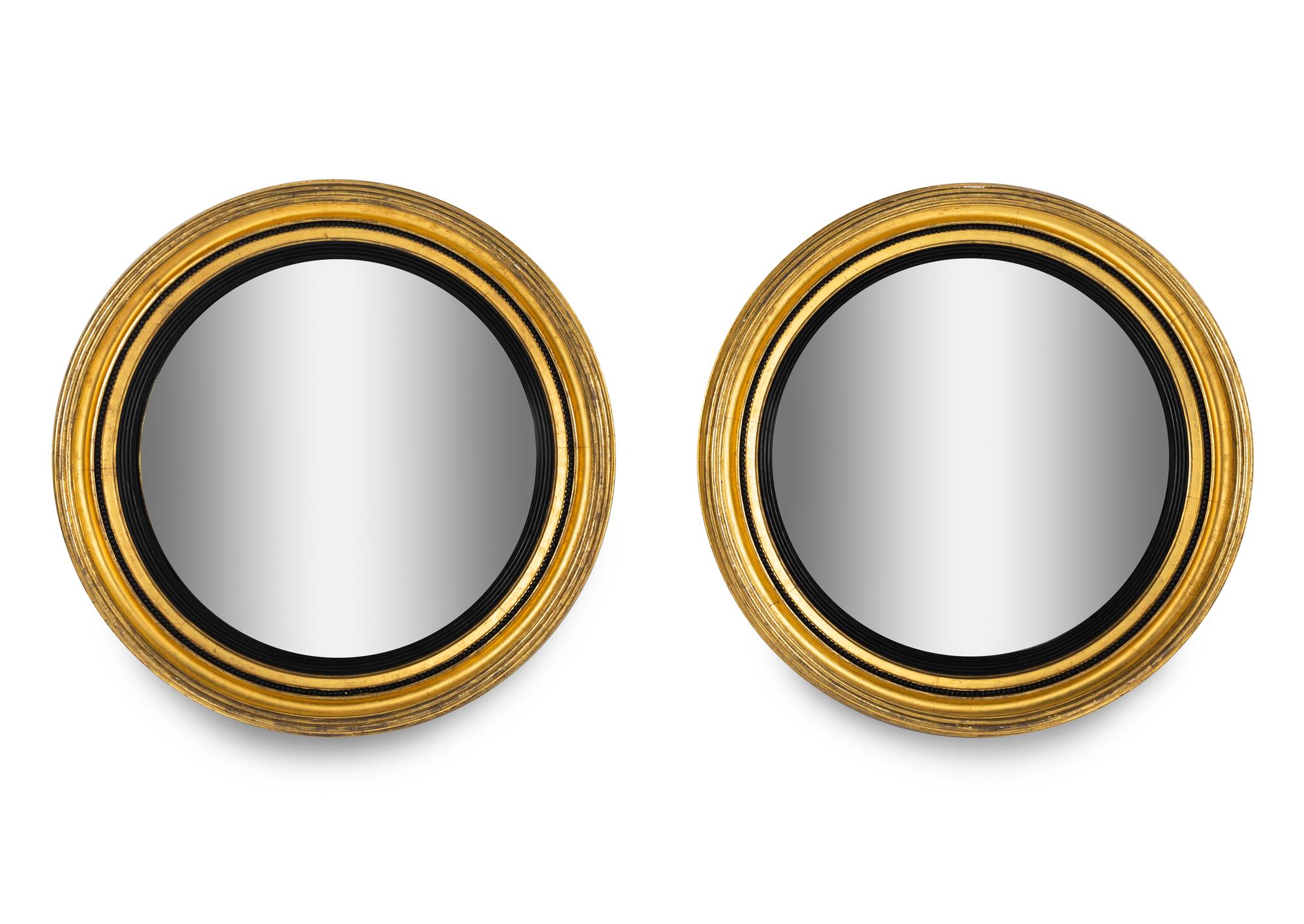 A Pair of English Giltwood Bullseye Mirrors