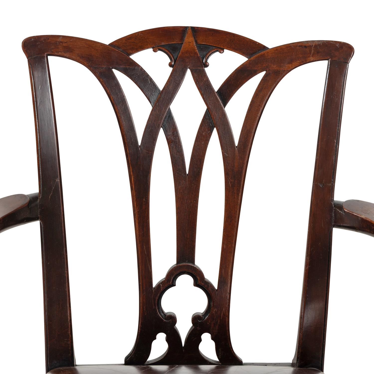 A Set of Fourteen English Mahogany Dining Chairs