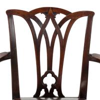 A Set of Fourteen English Mahogany Dining Chairs