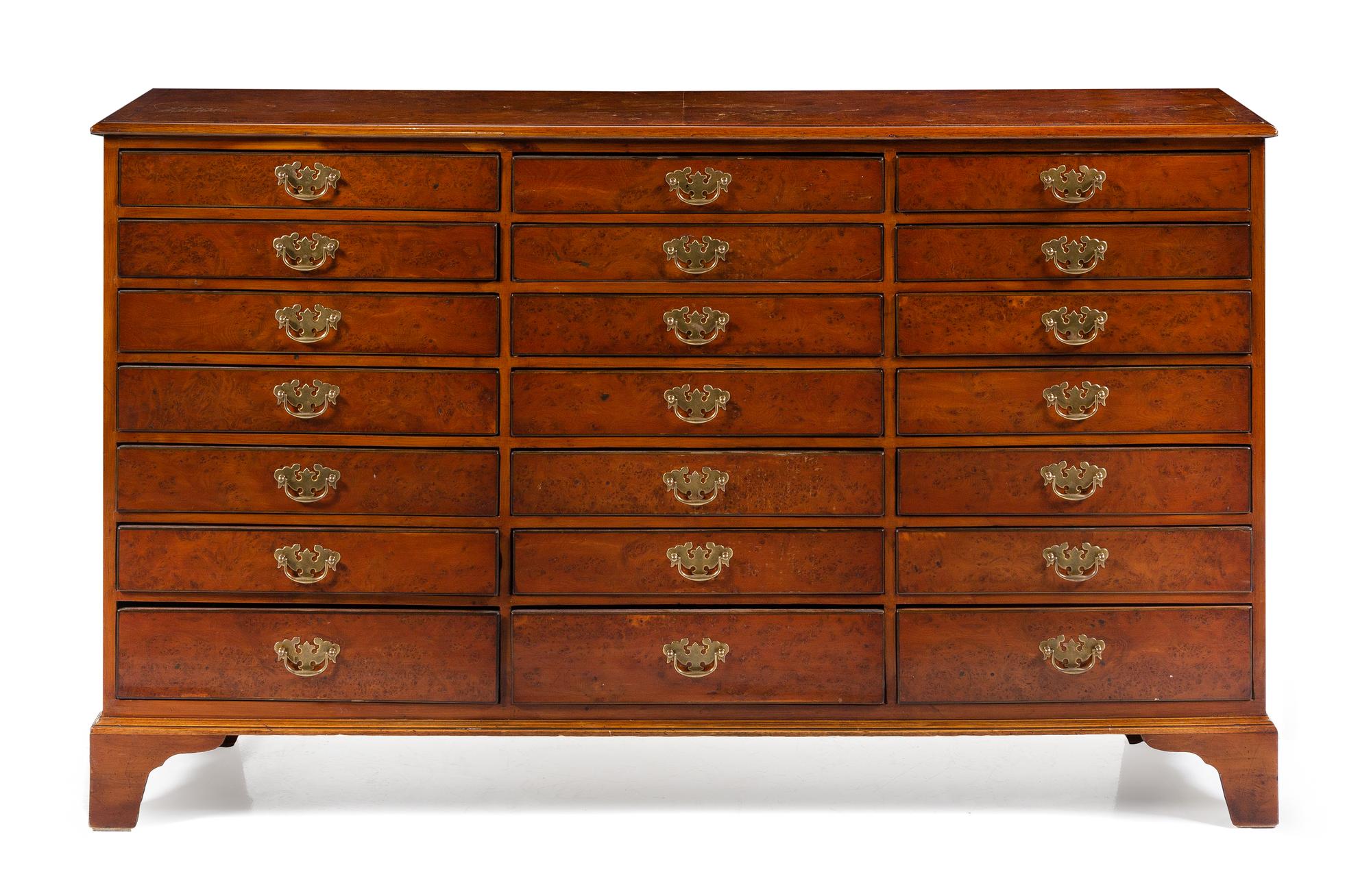 A George III Yew or Burlwood Chest of Drawers Height 36 1/2 x width 62 x depth 14 inches. — EARLY 19TH CENTURY