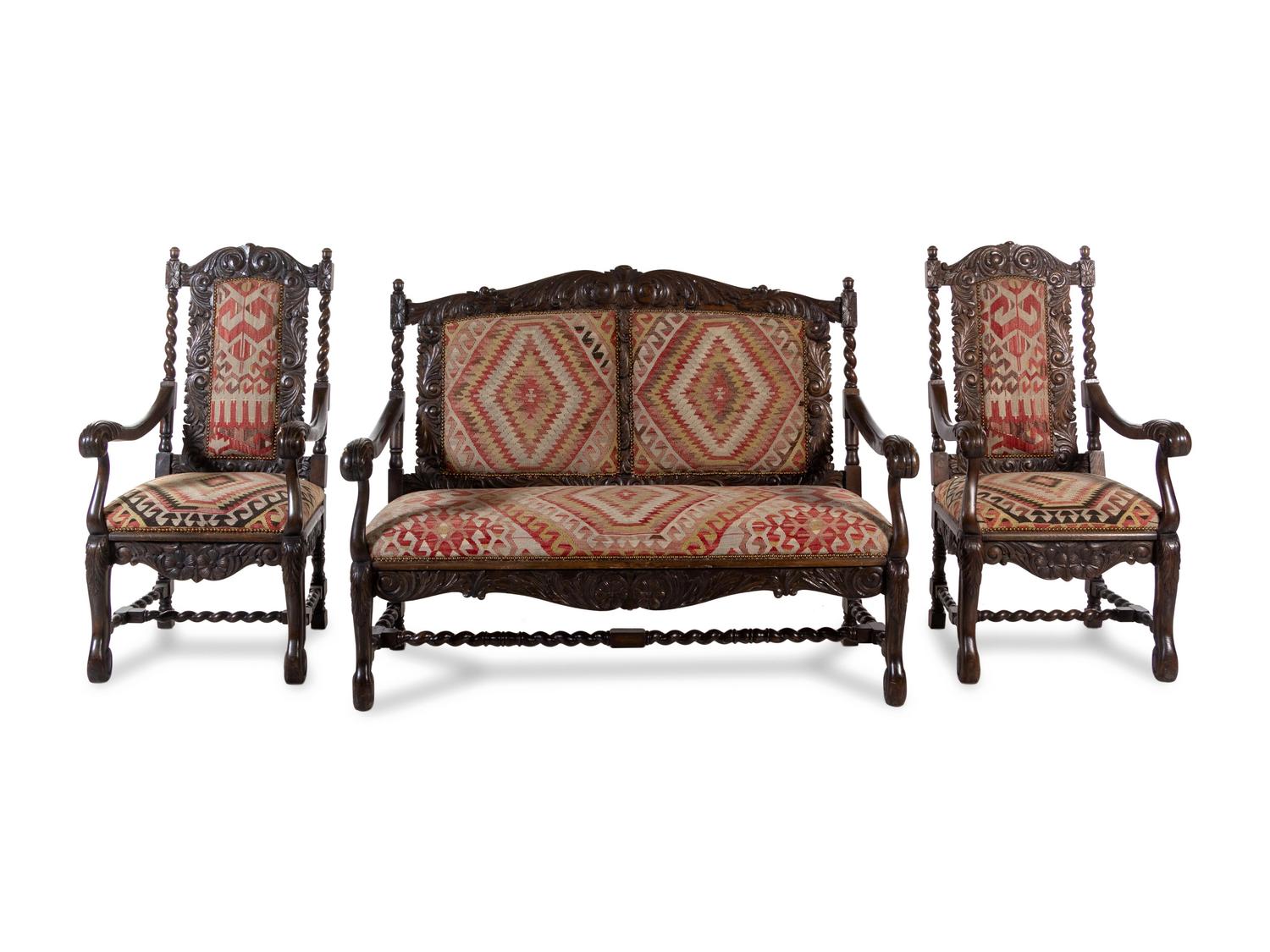 A Renaissance Revival Carved Oak Parlor Suite