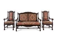 A Renaissance Revival Carved Oak Parlor Suite