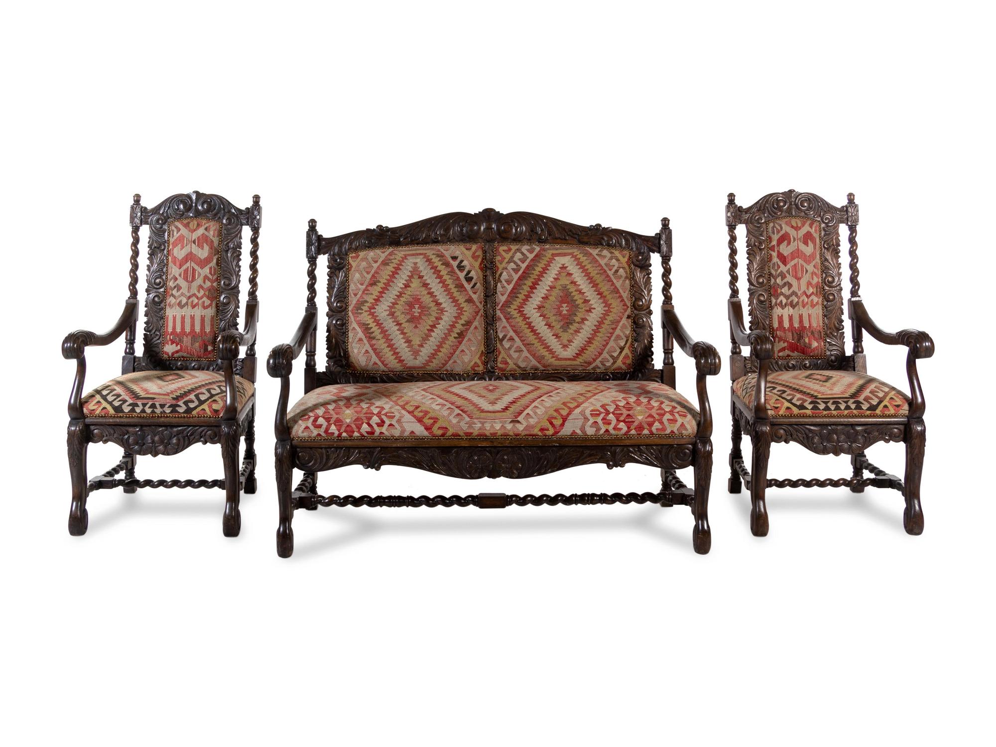 A Renaissance Revival Carved Oak Parlor Suite