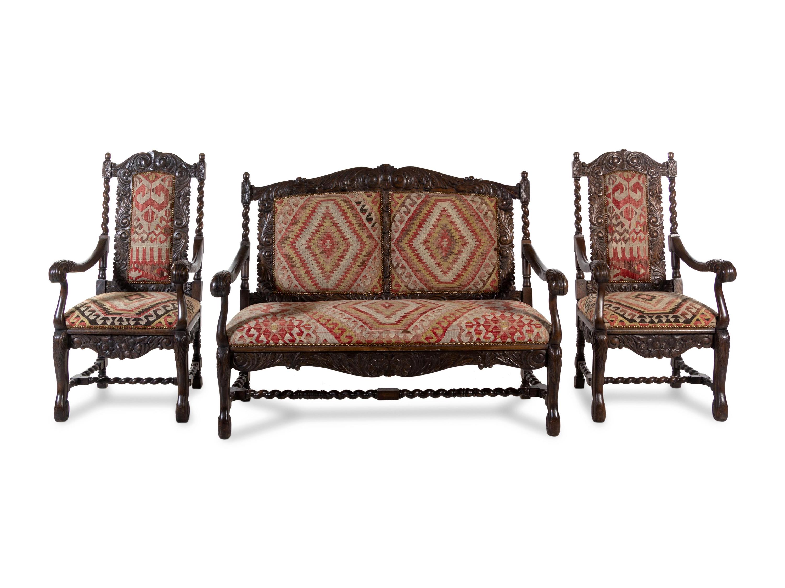 A Renaissance Revival Carved Oak Parlor Suite