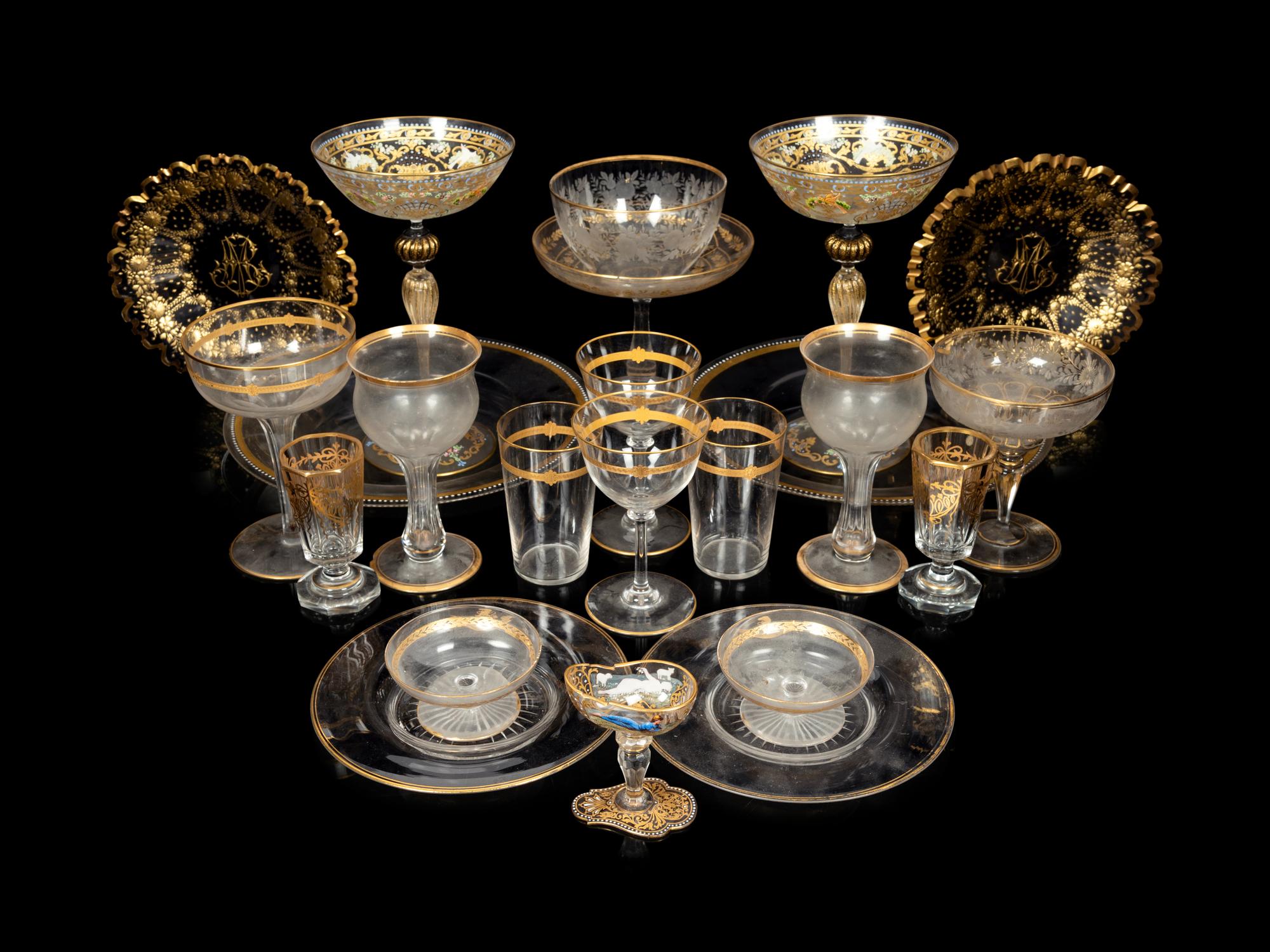 A Set of Eight Venetian Enameled Glass Champagne Coupes and a Group of Gilt Decorated Glass Table Articles