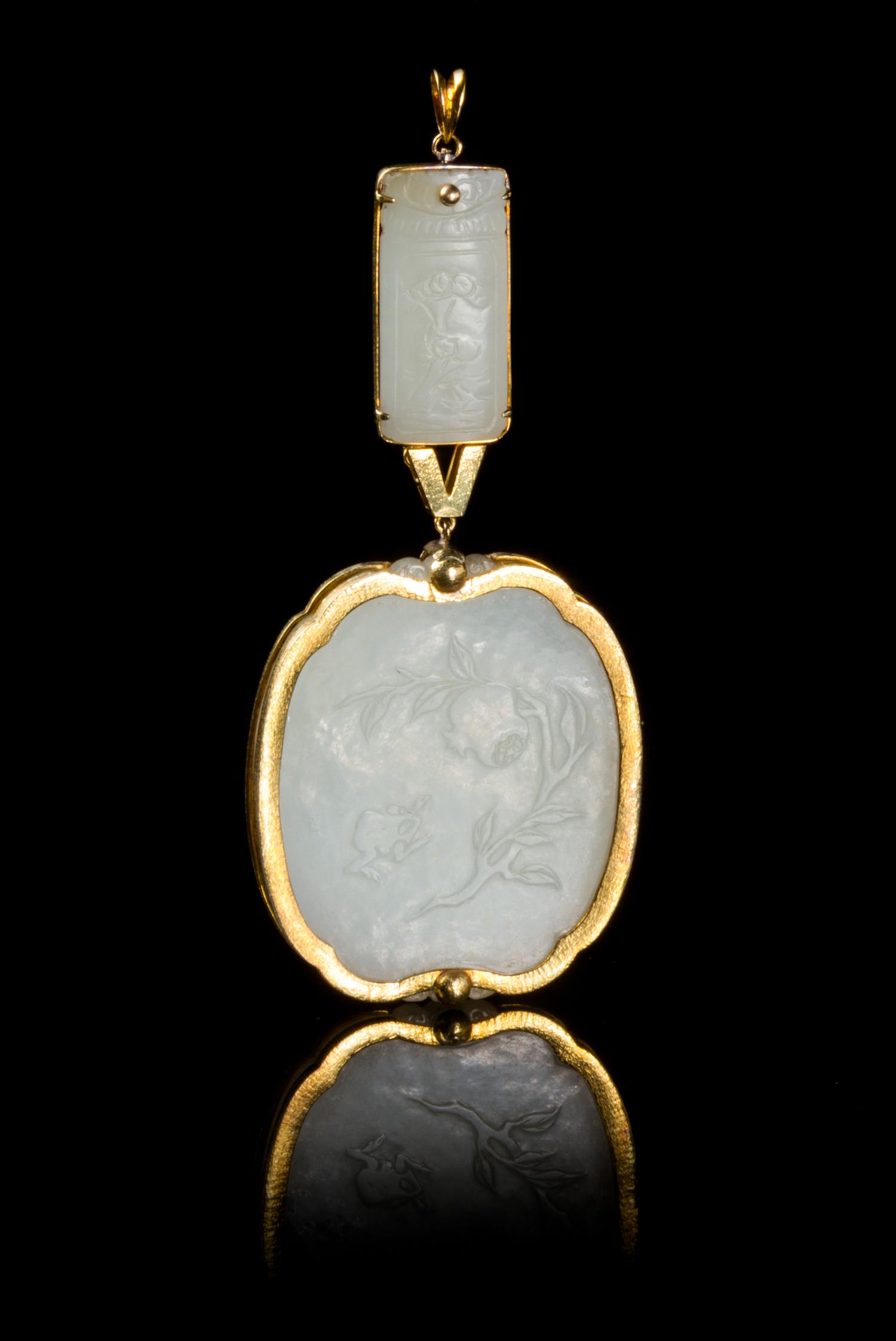 Two Chinese 14 Karat Gold Mounted White Jade Plaques 18TH/19TH CENTURY Large plaque 2 1/4 inches, small plaque 1 1/4 inches. — 18TH/19TH CENTURY