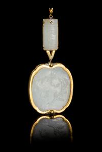 Two Chinese 14 Karat Gold Mounted White Jade Plaques 18TH/19TH CENTURY Large plaque 2 1/4 inches, small plaque 1 1/4 inches. — 18TH/19TH CENTURY