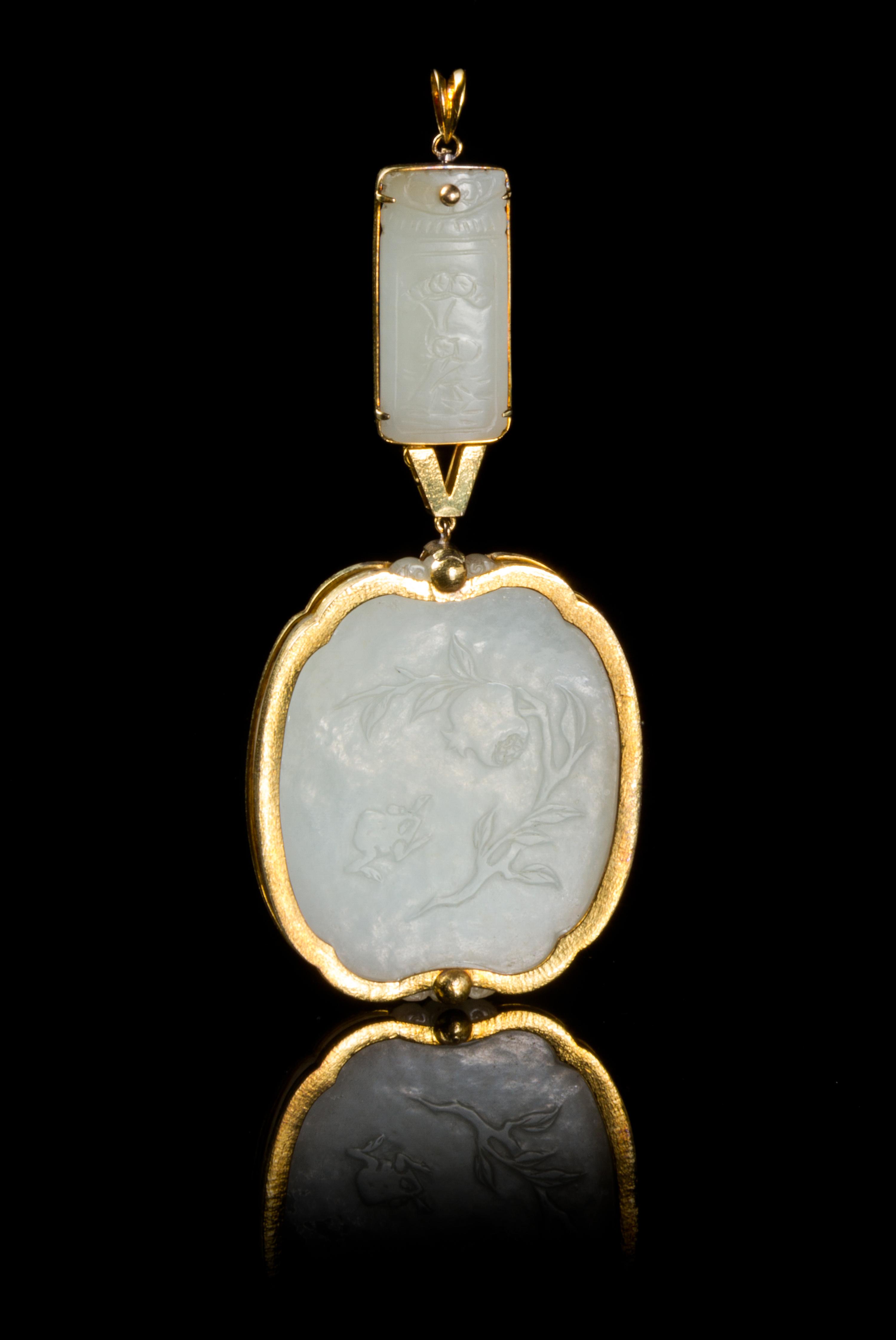 Two Chinese 14 Karat Gold Mounted White Jade Plaques 18TH/19TH CENTURY Large plaque 2 1/4 inches, small plaque 1 1/4 inches. — 18TH/19TH CENTURY