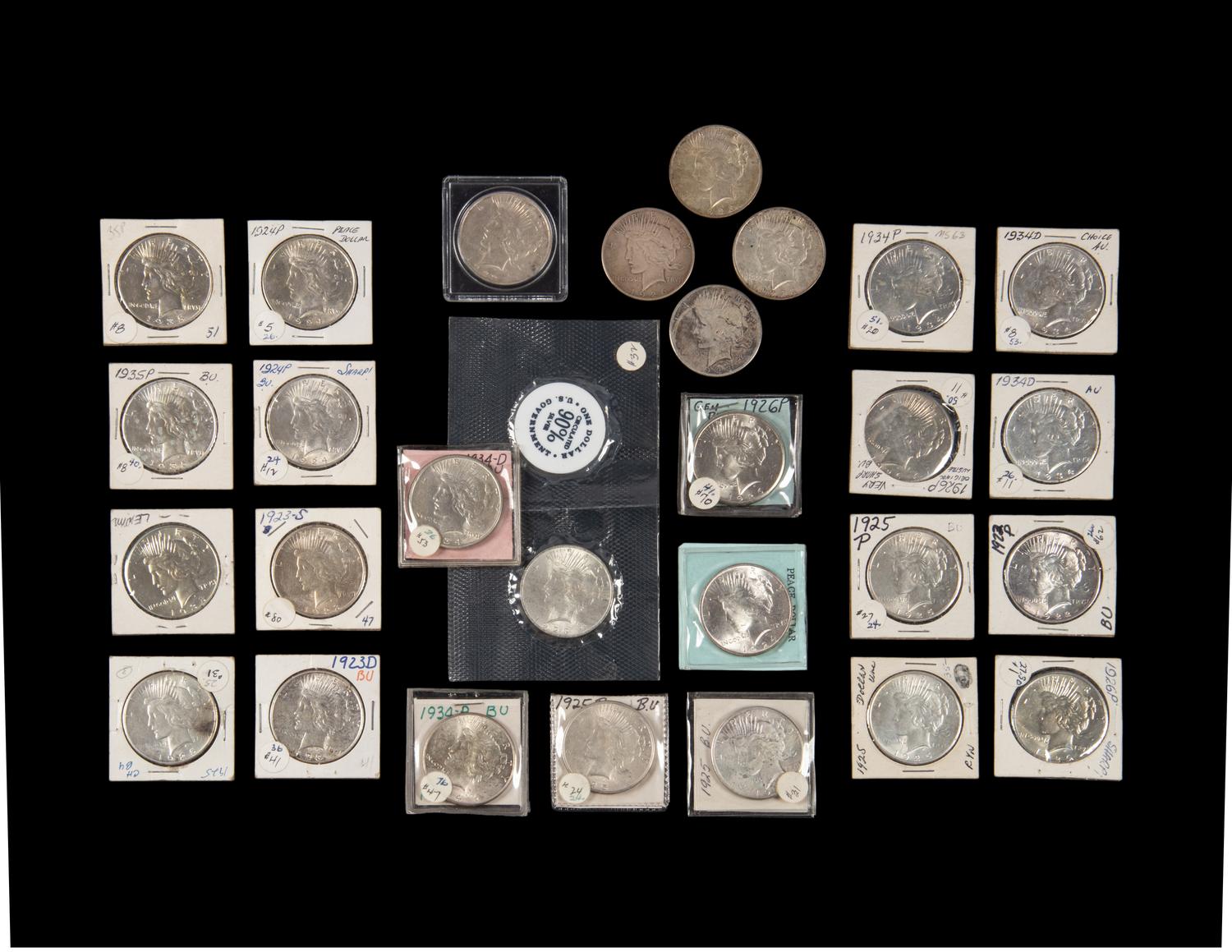 A Group of Twenty-Eight Peace $1 Coins