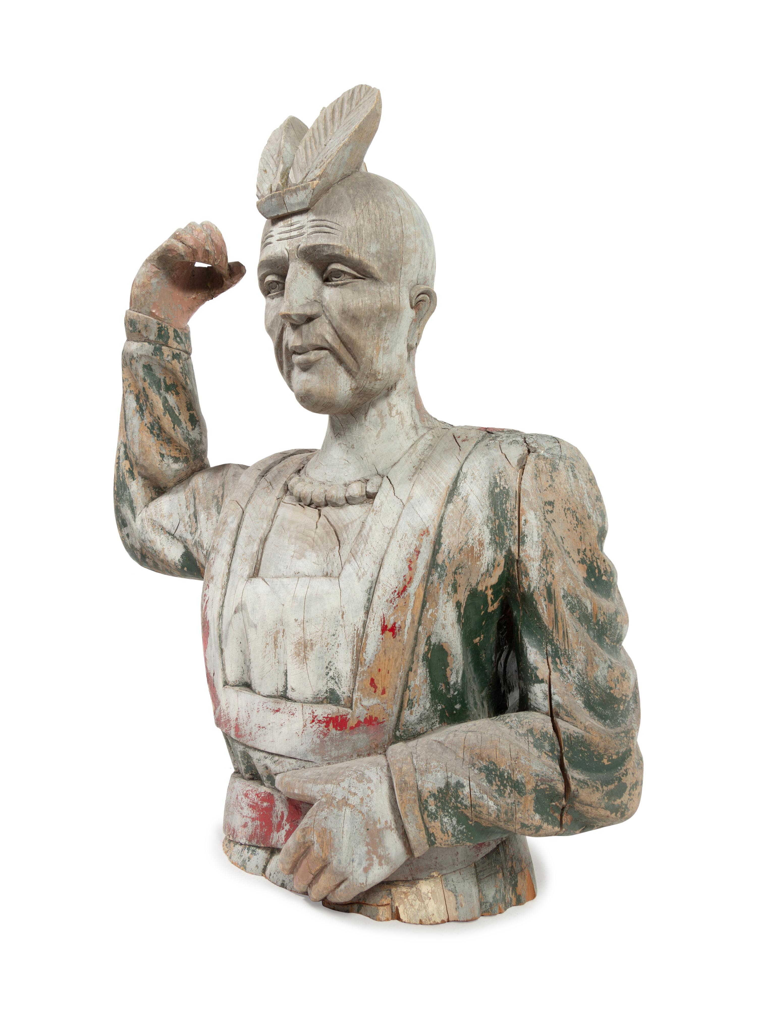 A Carved and Paint-Decorated Cigar Store Counter Top Native American Bust