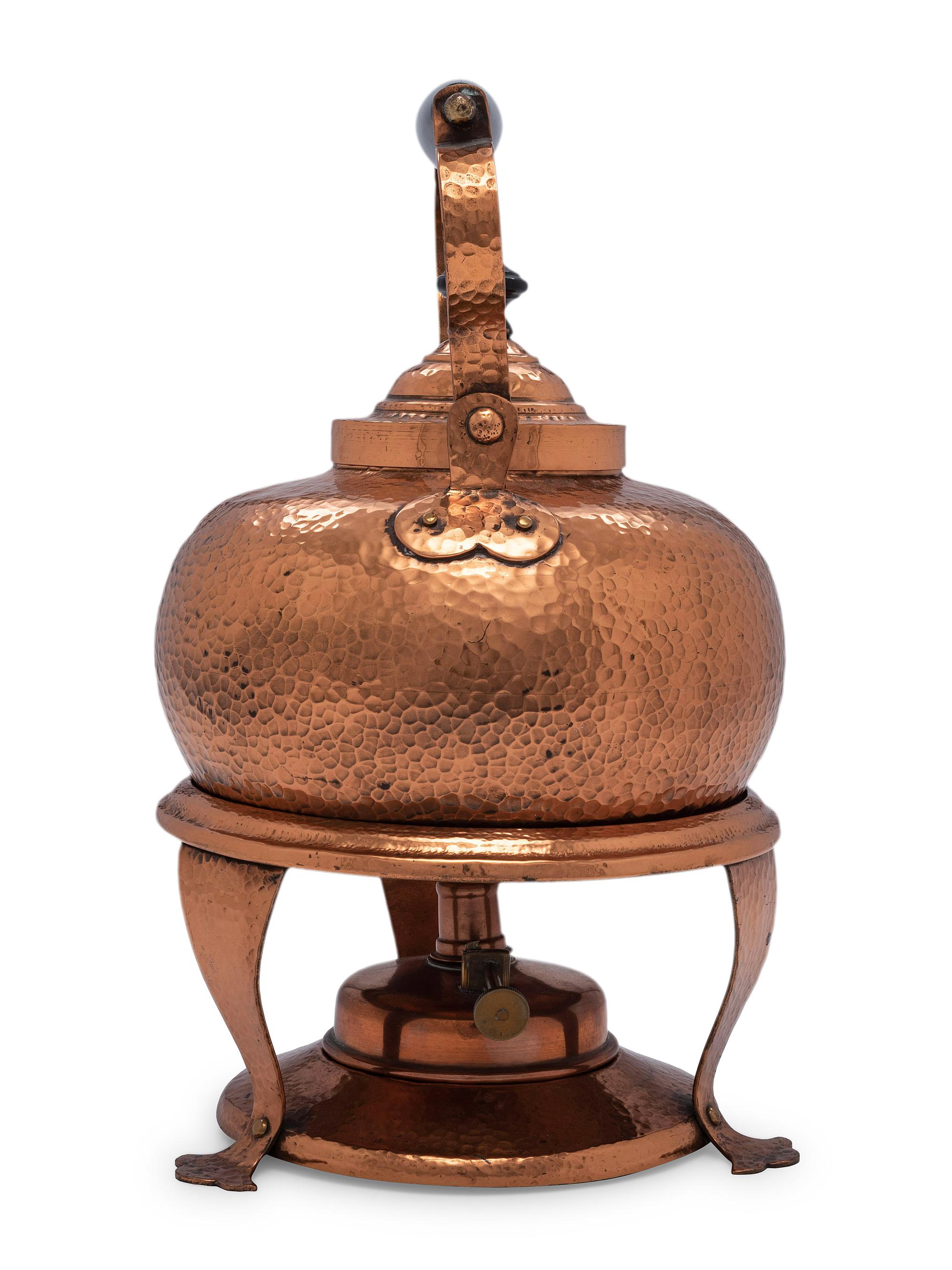An American Hammered Copper Kettle on Stand