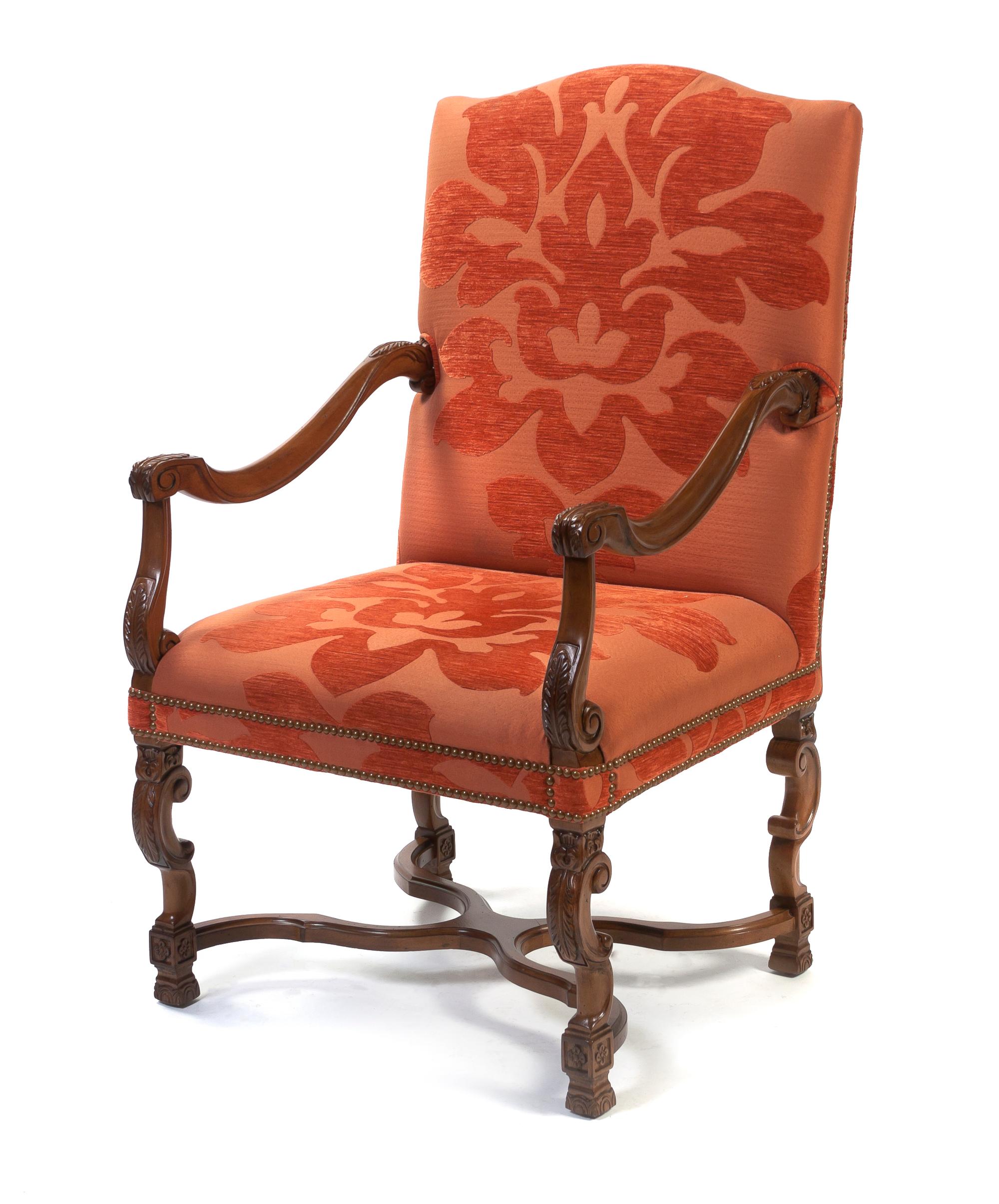 A Henry II Style Oak Open Armchair, Height 43 inches.