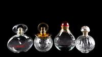 A Group of Four Factice Perfume Bottles