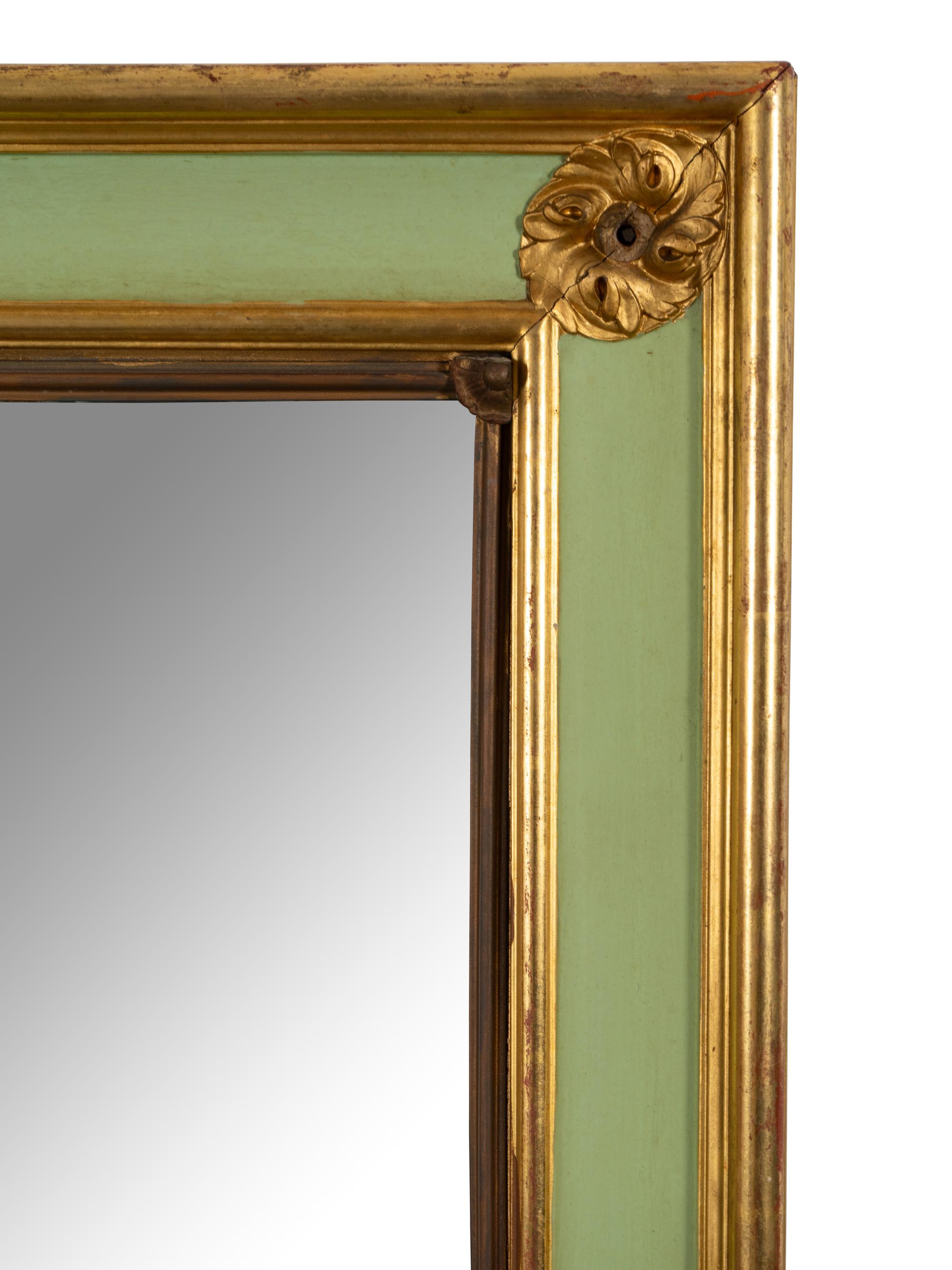 A Pair of Large Multi-Paned Mirrors in Painted Parcel Gilt Frames