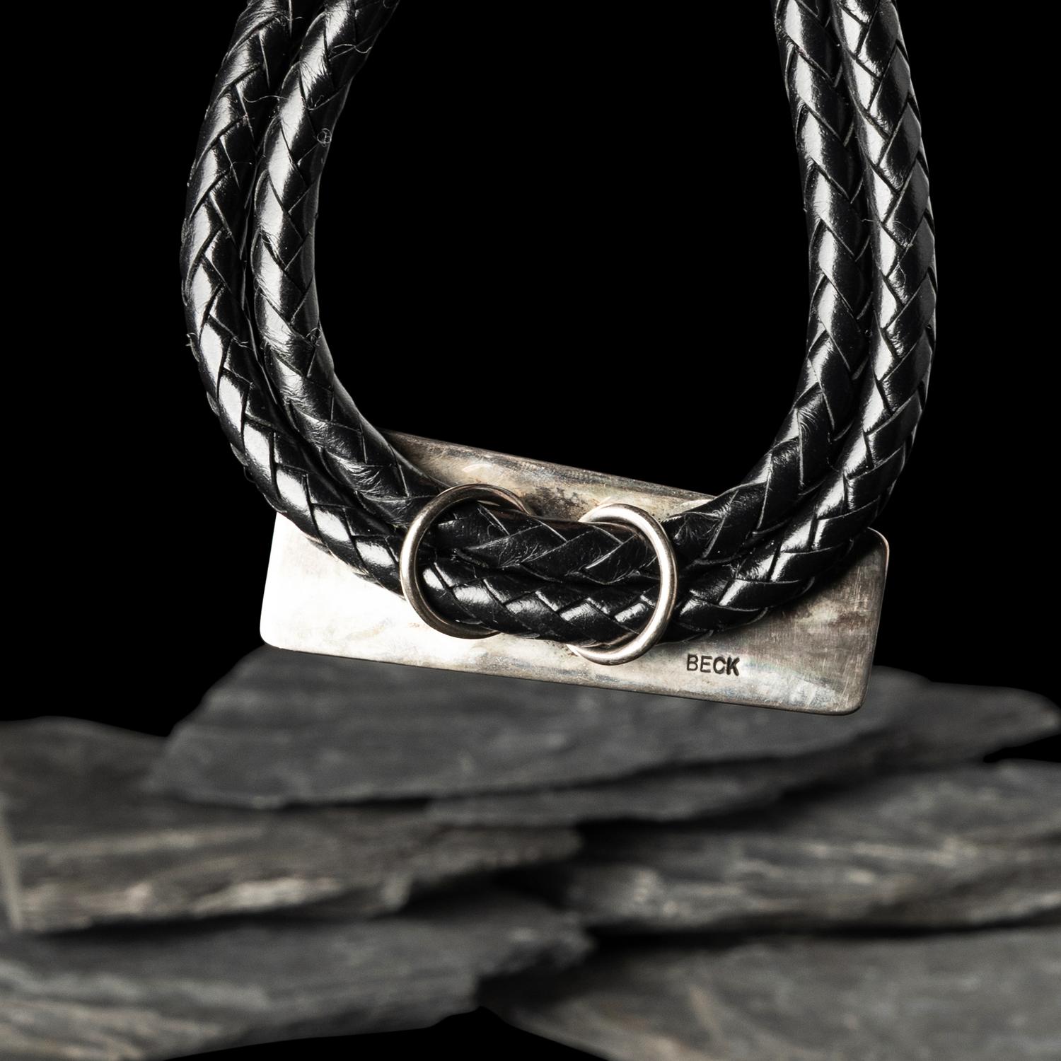 Victor Beck (Diné, 1941-2022) — Fluted Silver Bolo Tie with Inlay