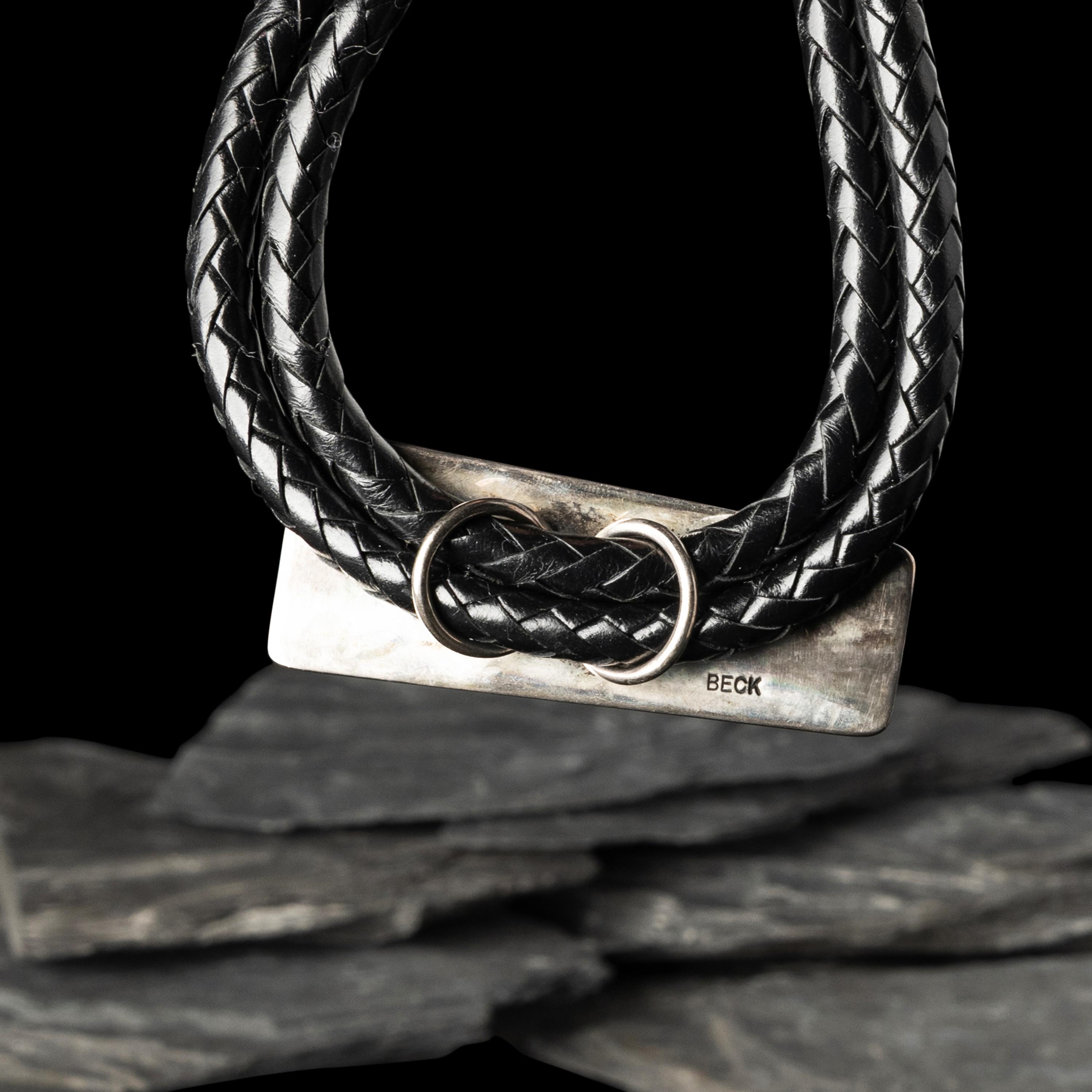 Victor Beck (Diné, 1941-2022) — Fluted Silver Bolo Tie with Inlay