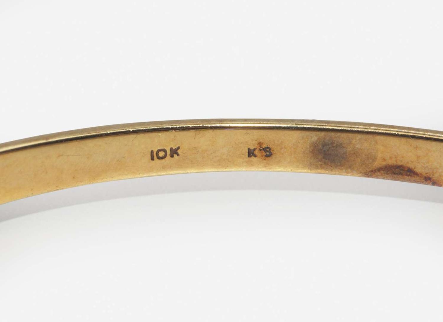 A Set of Gold and Diamond Bangles