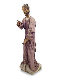 A Continental Painted Figure of a Saint