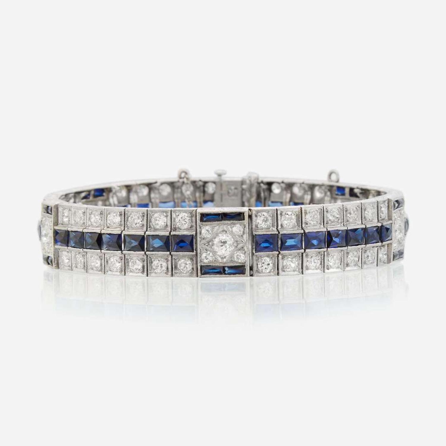 An Art Deco diamond, synthetic sapphire, and white gold bracelet