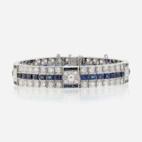 An Art Deco diamond, synthetic sapphire, and white gold bracelet