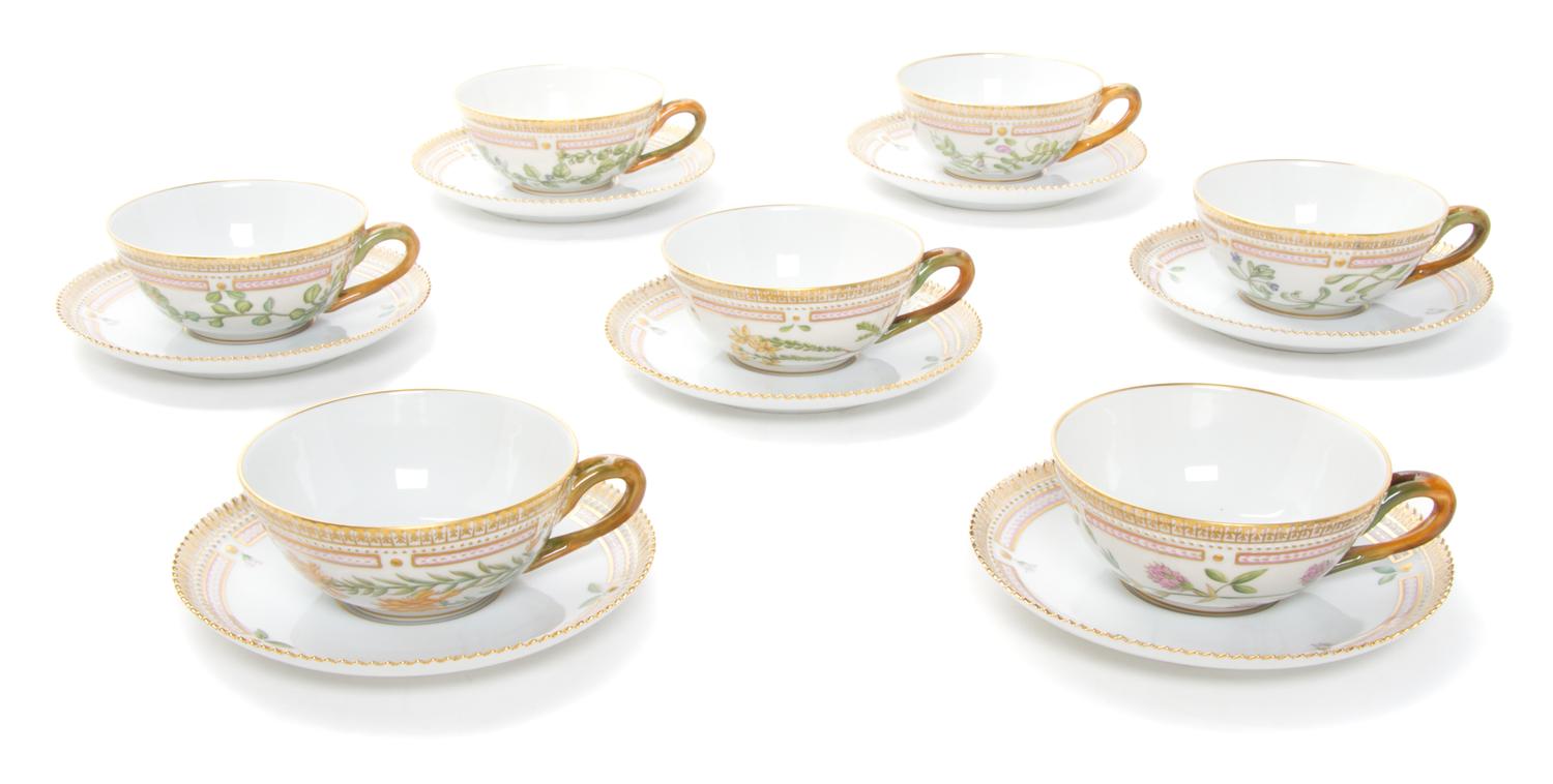 Eighteen Royal Copenhagen Flora Danica Teacups and Saucers Diameter 6 inches.