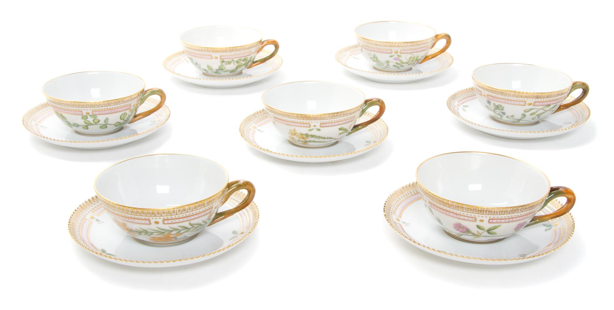 Eighteen Royal Copenhagen Flora Danica Teacups and Saucers Diameter 6 inches.
