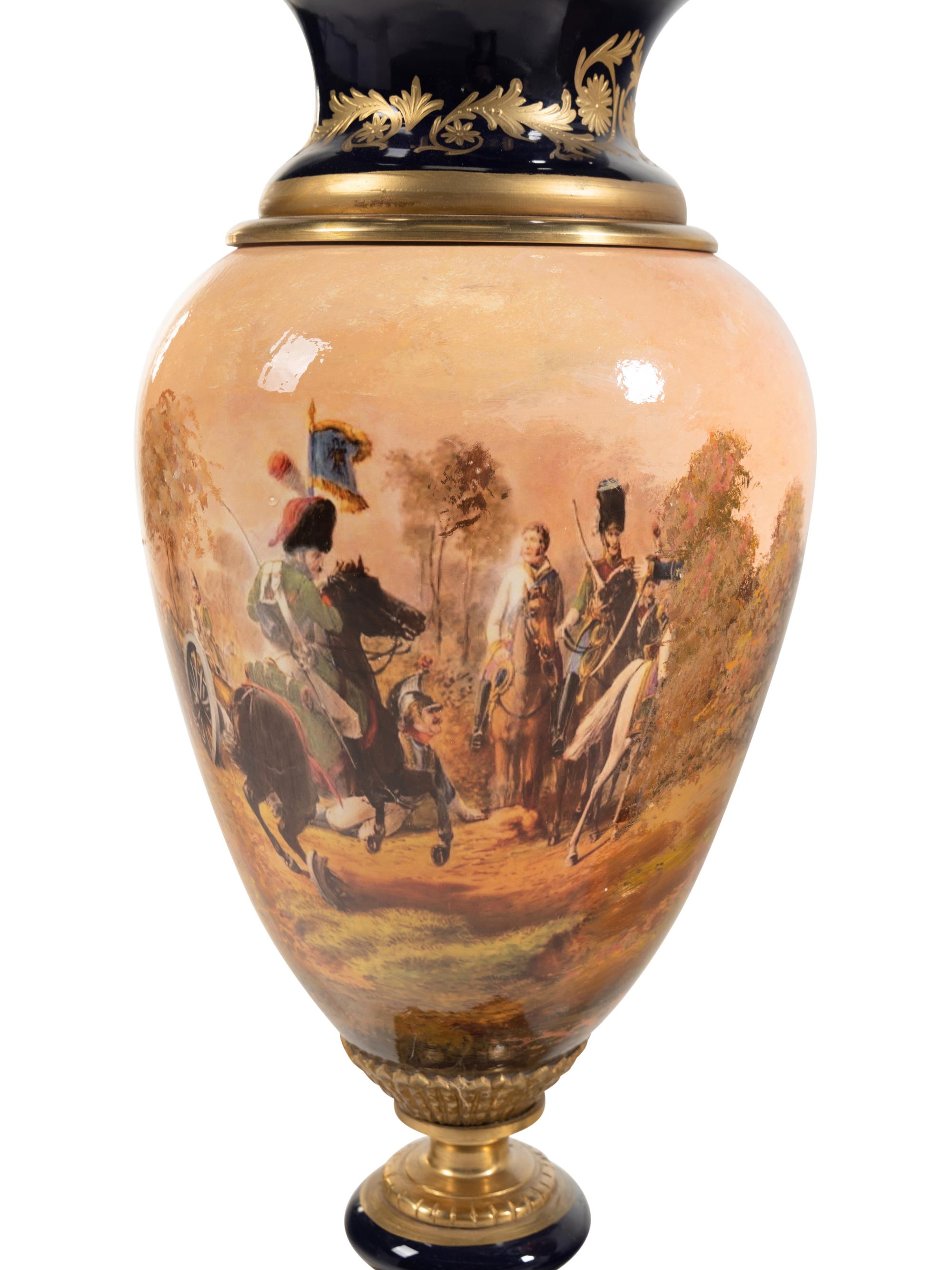 A Pair of Gilt Bronze Mounted Sèvres Style Porcelain Urns