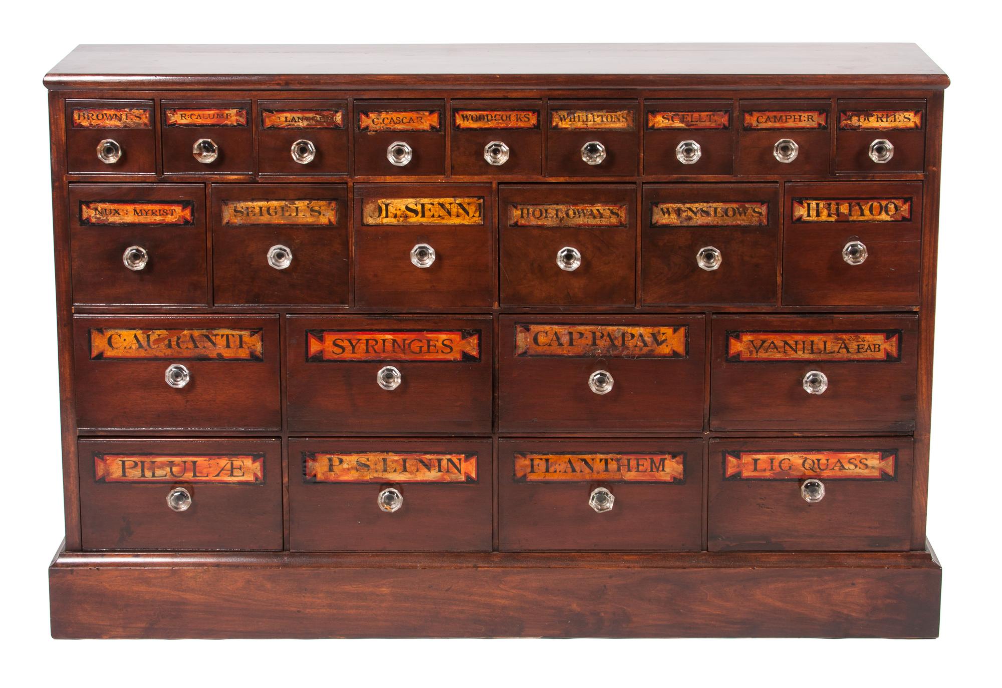 A Twenty-Three Drawer Apothecary Cabinet Height 33 x width 50 1/2 x depth 10 inches.