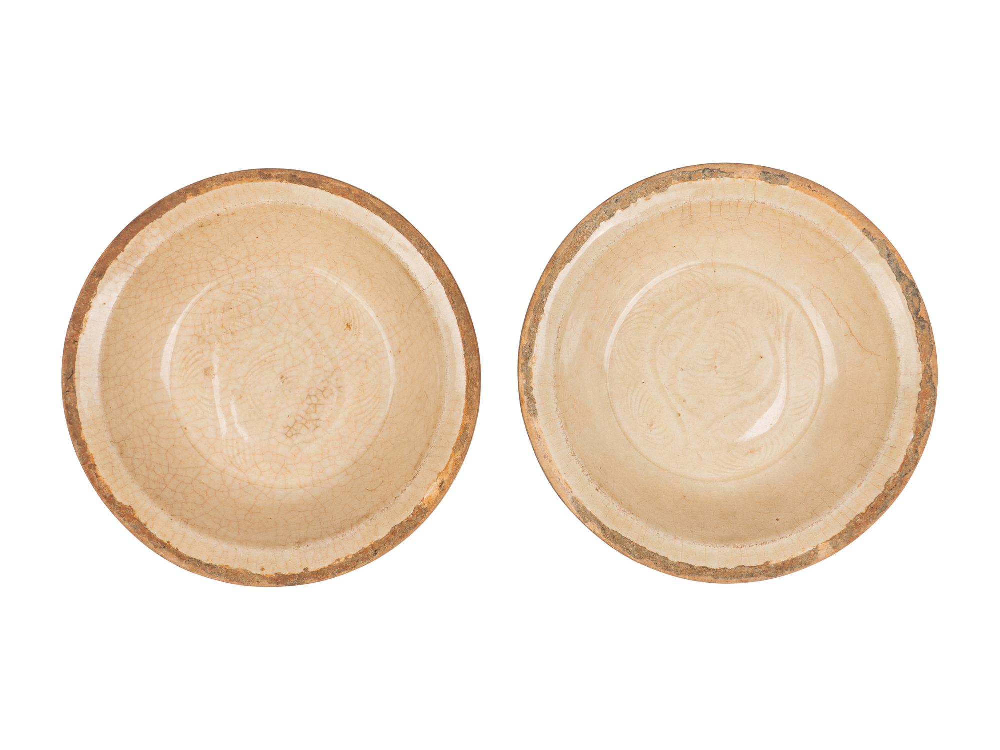 A Pair of Chinese White Ground Crackle Glazed Stoneware Bowls