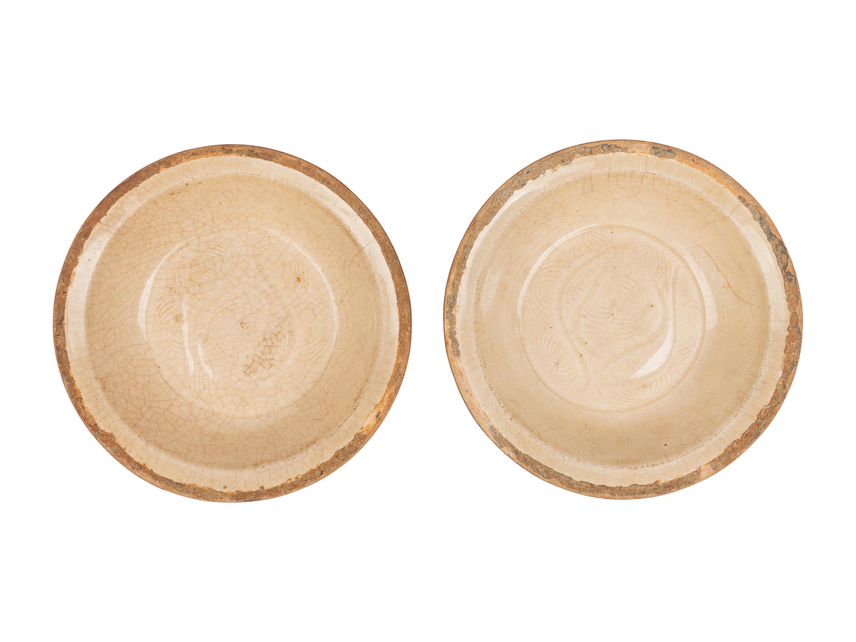 A Pair of Chinese White Ground Crackle Glazed Stoneware Bowls
