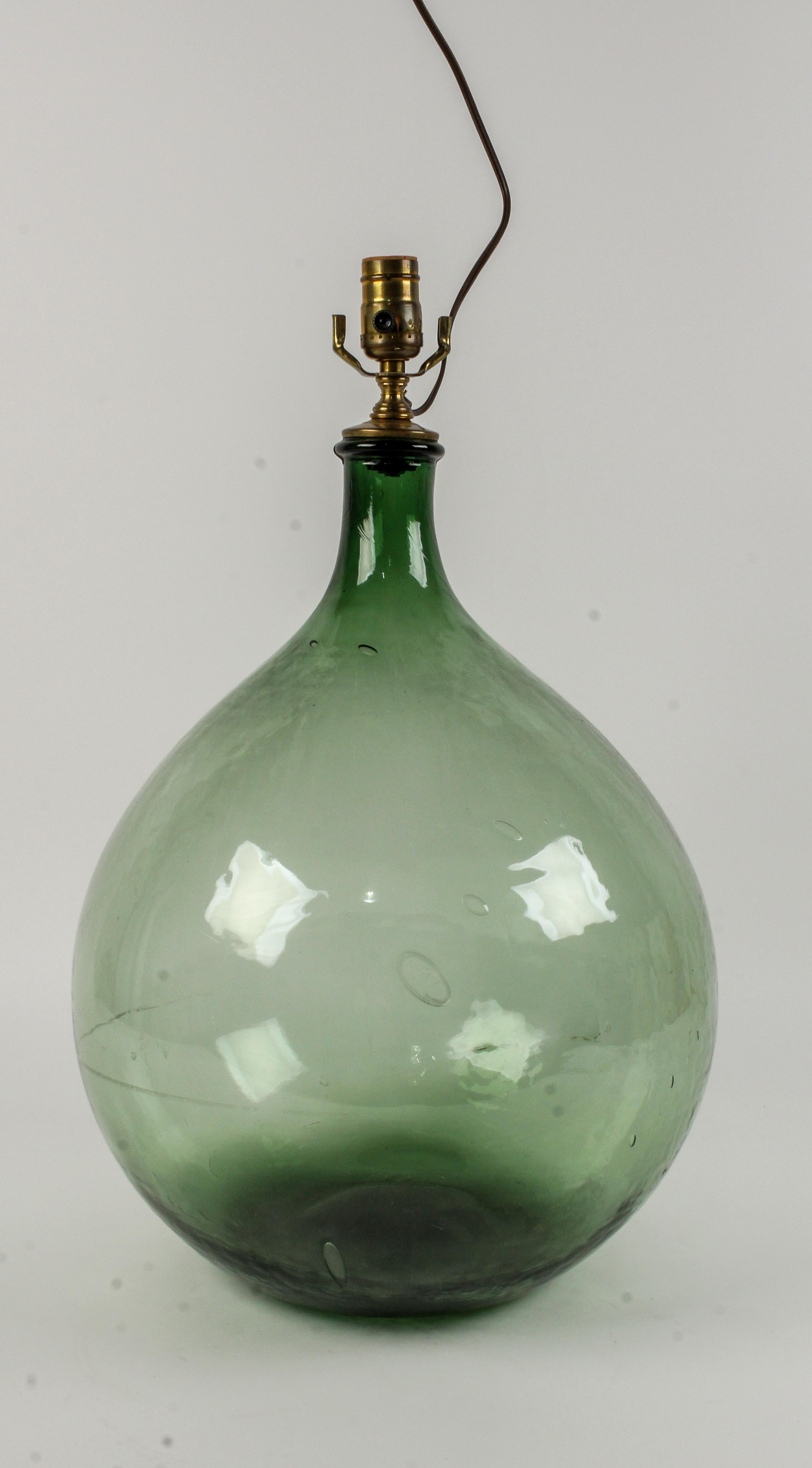 A Blown Glass Wine Jug Height overall 22 inches. — 19TH CENTURY