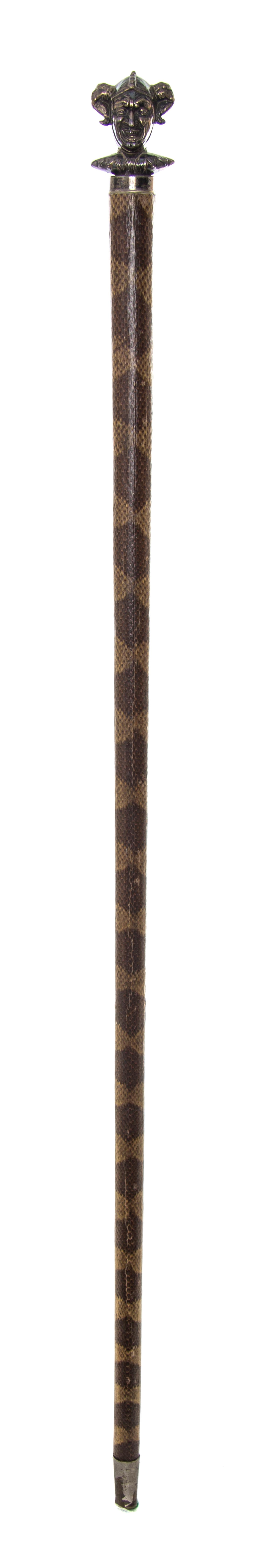 An American Sterling Silver Handled Walking Stick, Unger Brothers, Length of handle 2 1/2 x length overall 32 1/2 inches.