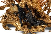 A French Gilt and Patinated Bronze Pendule à la Gloire du Roi