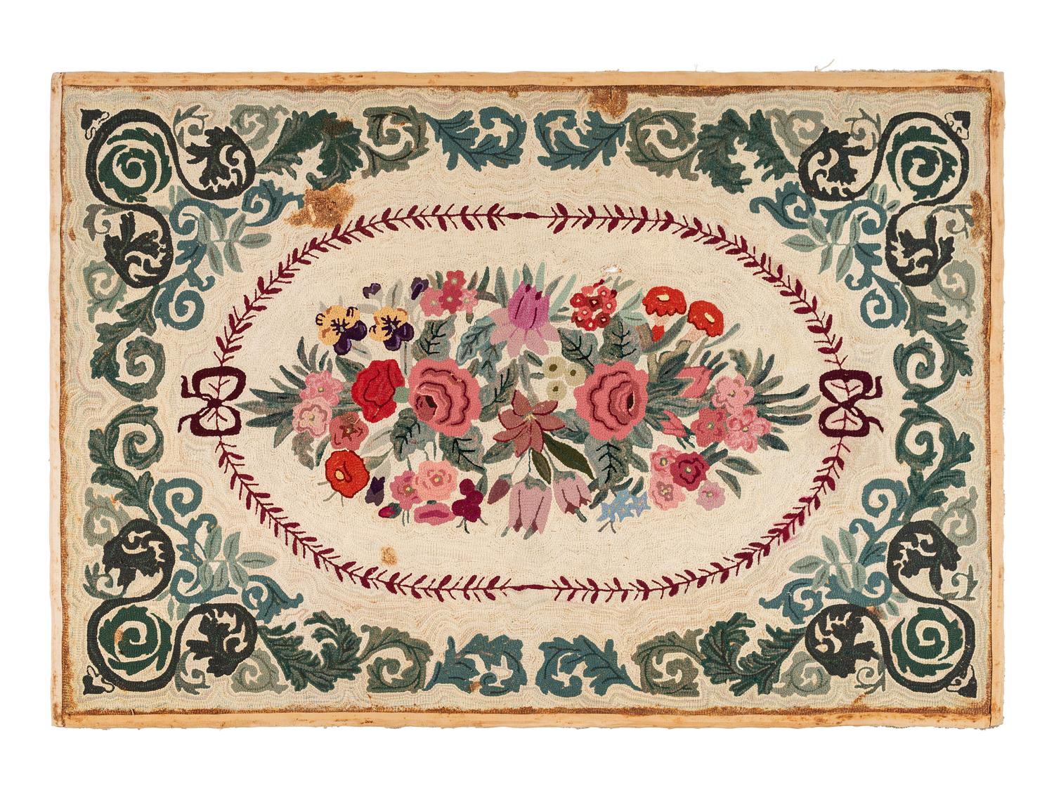 A Large Cotton Floral Spray and Acanthus Scroll Decorated Hooked Rug