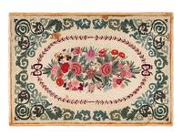 A Large Cotton Floral Spray and Acanthus Scroll Decorated Hooked Rug