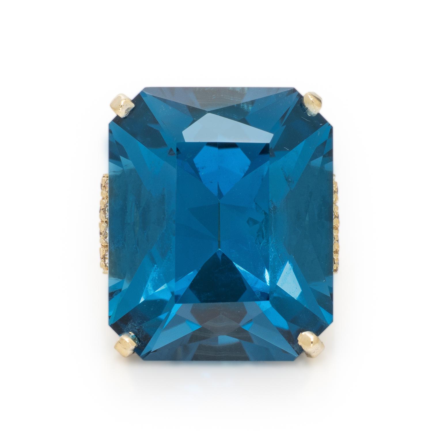 Blue Topaz and Diamond Ring