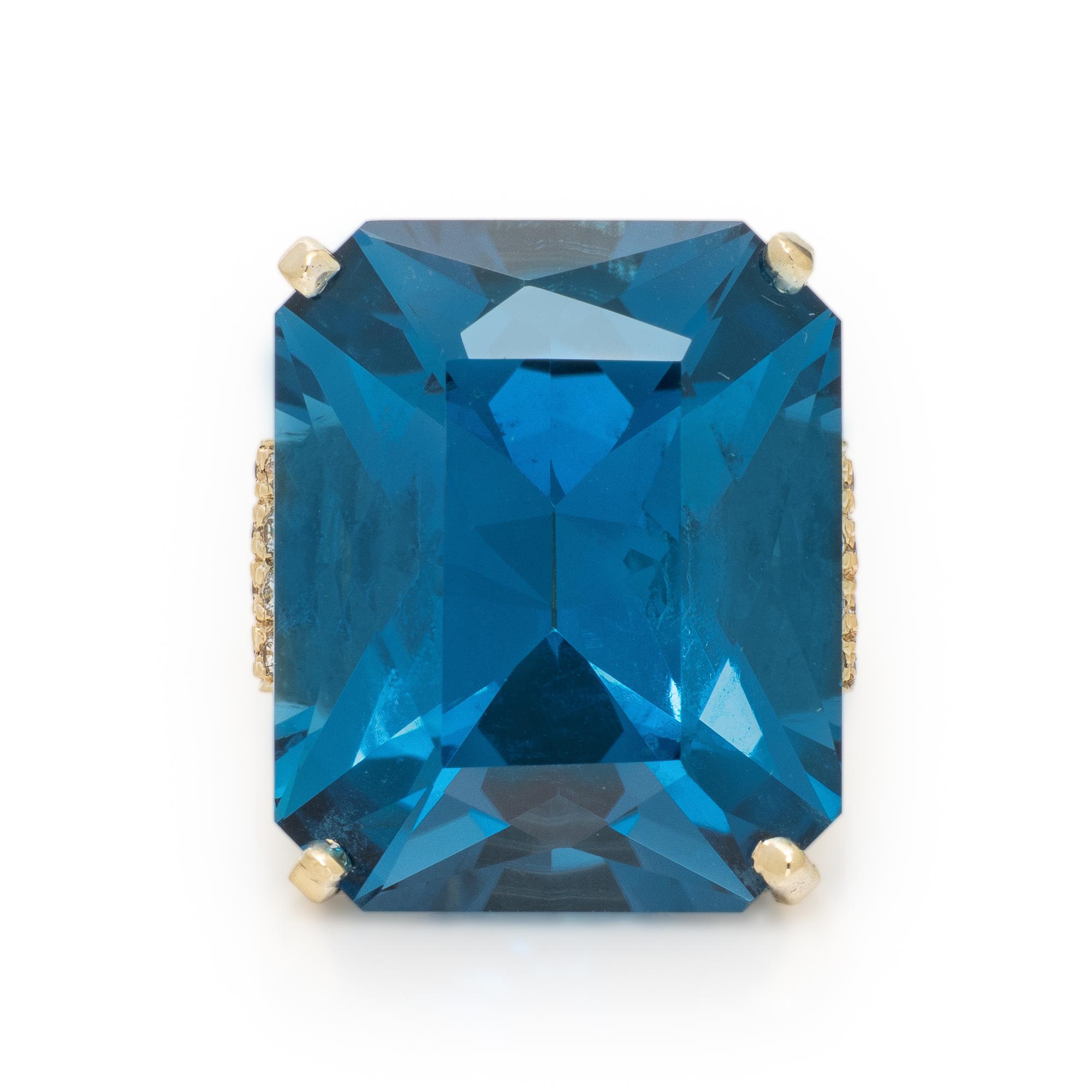Blue Topaz and Diamond Ring