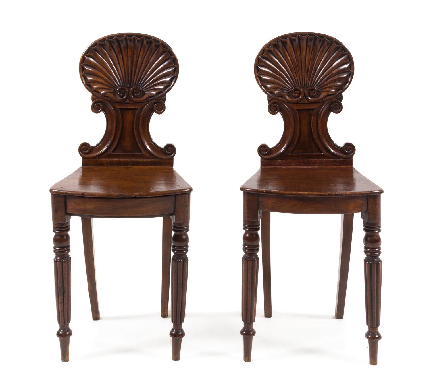 A Pair of Regency Mahogany Hall Chairs Height 34 1/8 inches. — 19TH CENTURY