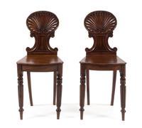 A Pair of Regency Mahogany Hall Chairs Height 34 1/8 inches. — 19TH CENTURY