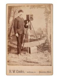 [EARLY PHOTOGRAPHY]. COOKS, H.W., photog. Cabinet card of a photographer with camera. Beverly, OH.