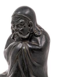 A Chinese Black Glazed Porcelain Figure of Seated Damo