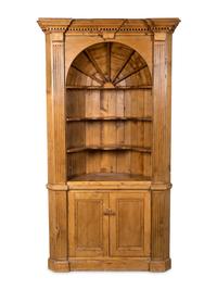 A George III Style Carved Pine Corner Cupboard