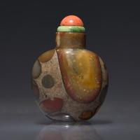 A Chinese Puddingstone Snuff Bottle, Qing Dynasty, 19th Century — 清晚期 抱子石素面鼻煙壺