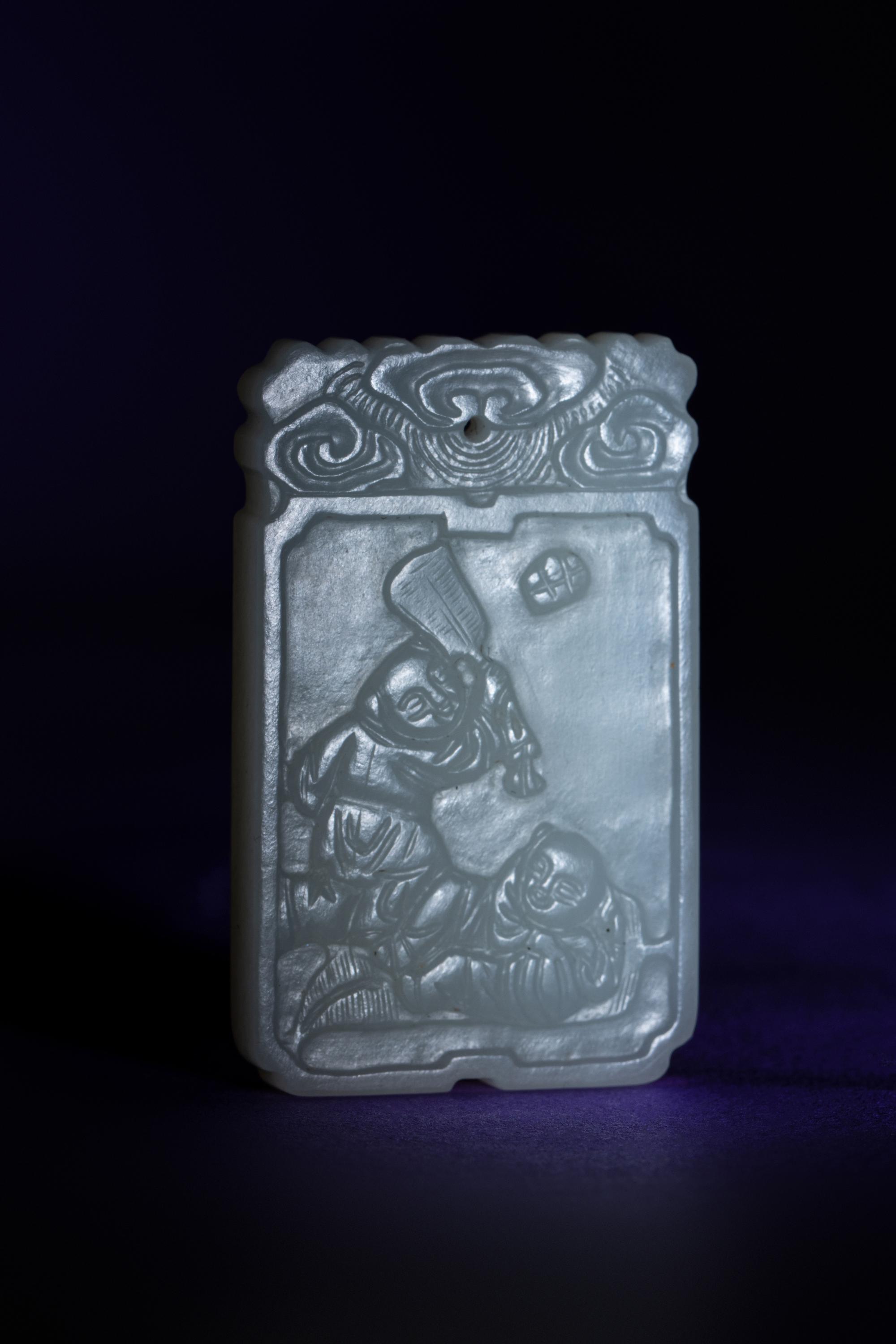 A Chinese White Jade 'Boys' Rectangular Pendant