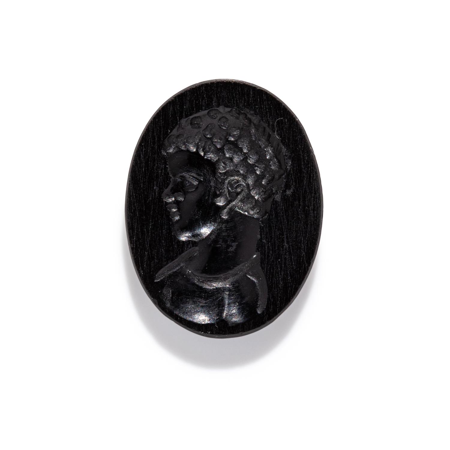 A Roman Black Jasper Ring Stone with a Portrait Head of a Nubian Youth