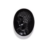 A Roman Black Jasper Ring Stone with a Portrait Head of a Nubian Youth