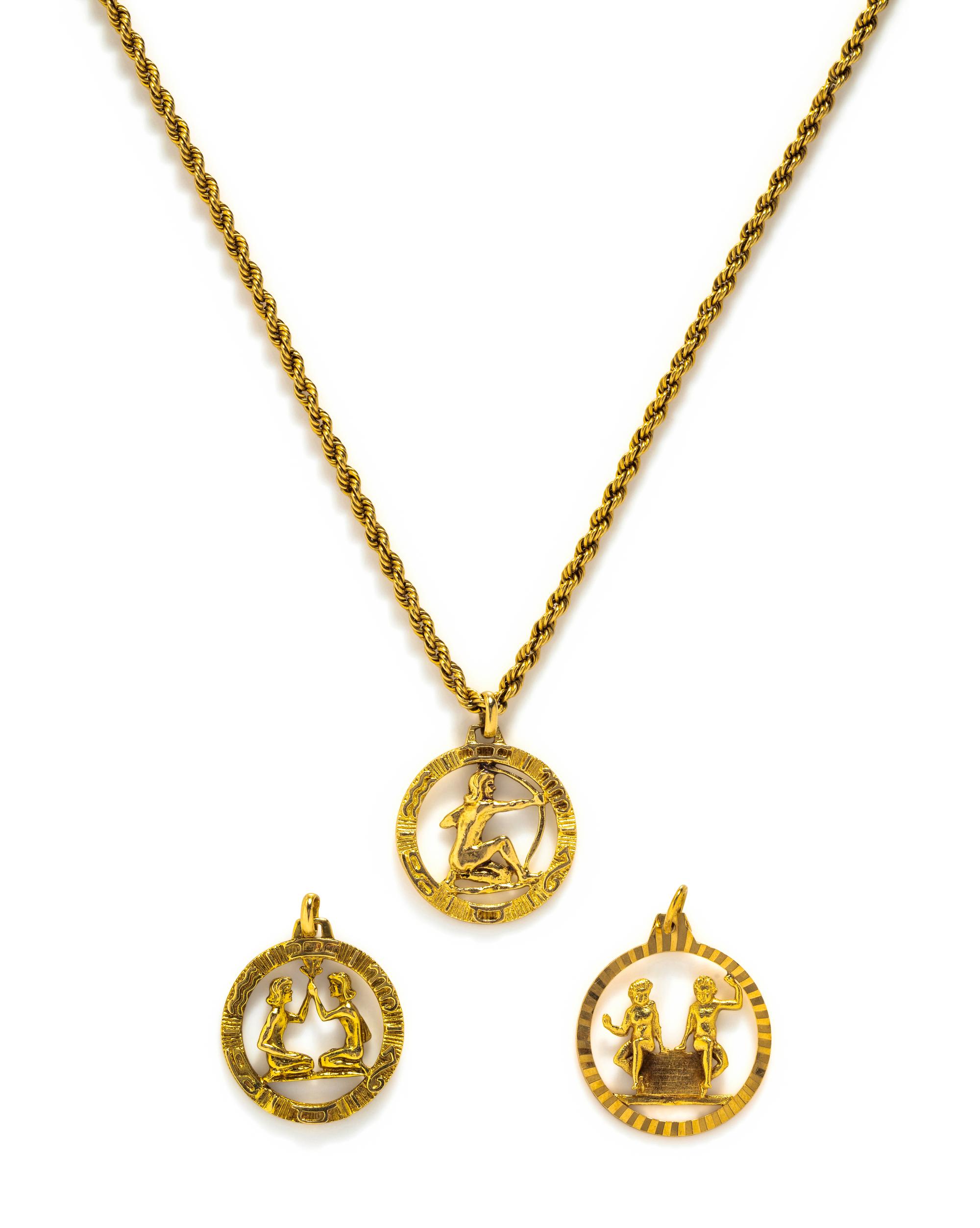 YELLOW GOLD CHAIN WITH THREE ZODIAC PENDANTS