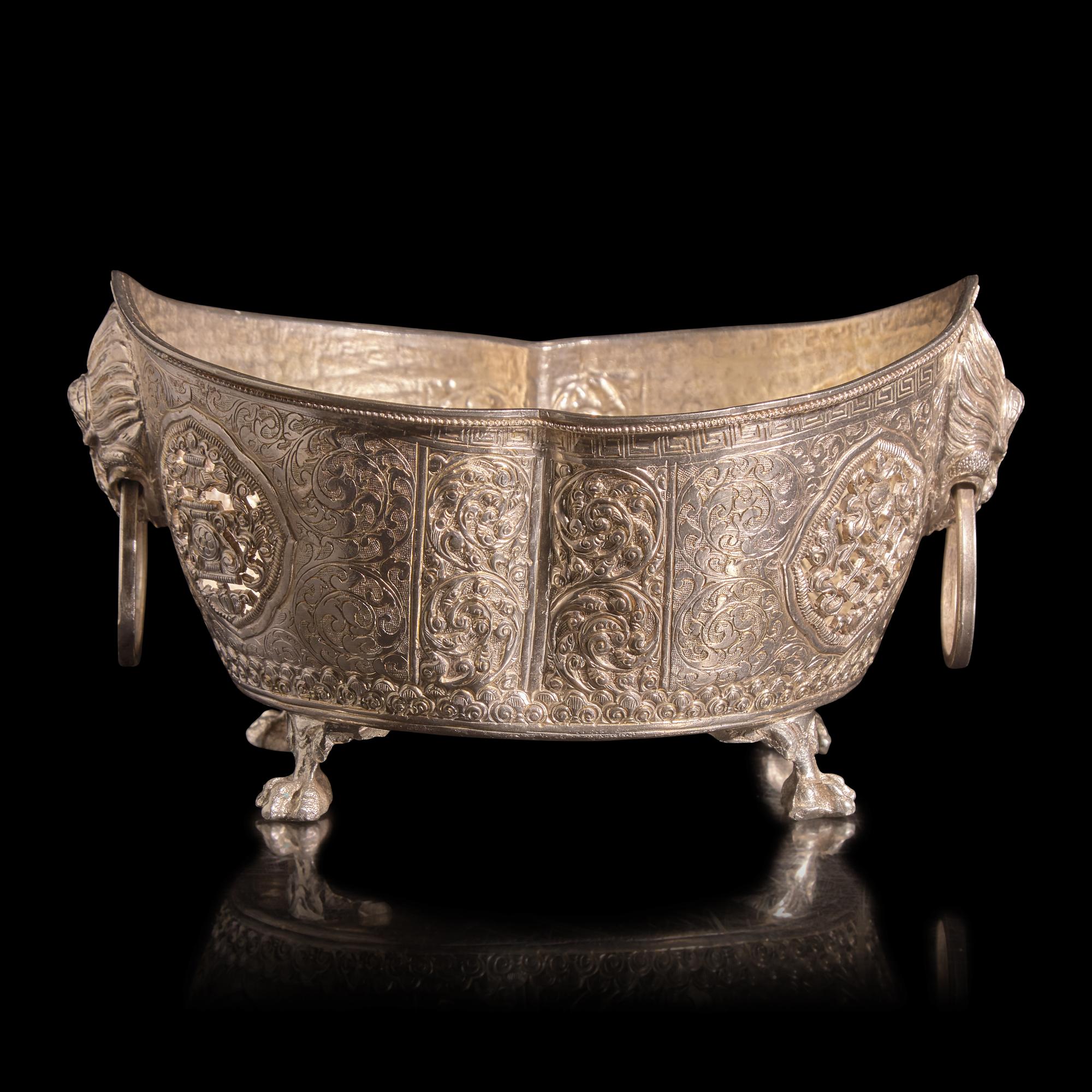 A Chinese or Southeast Asian Silver Alloy Navette-Form Reticulated Footed Bowl — 東南亞銀合金鏨花碗